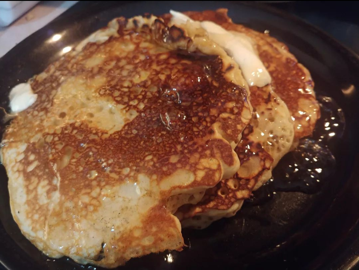 Making sourdough pancakes sweetened with honey